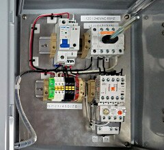 Inside of a refueling station control panel that controls a single pump with one hose