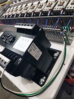 FMX transformer installed in pump control panel.